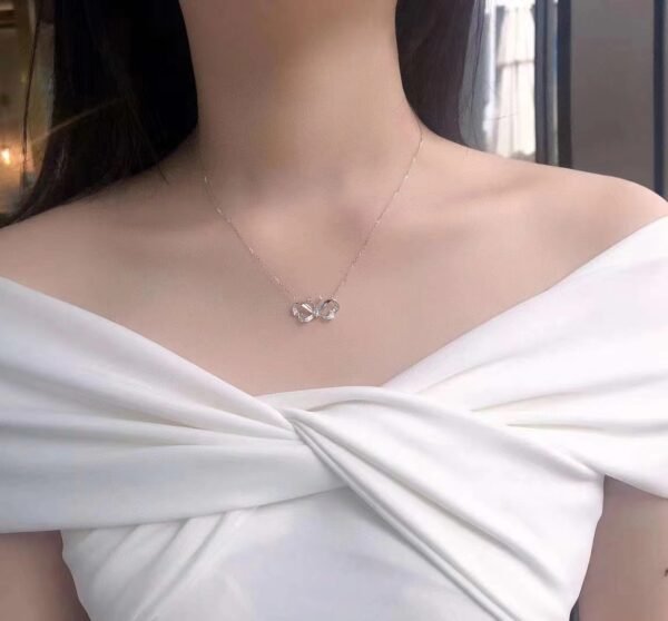微信图片_20240725104819 SGARIT Fine Jewelry Factory Real 18k White Gold 0.106 Carats Oval Cut Jewellery Romantic White Natural Diamond Butterfly Pendant