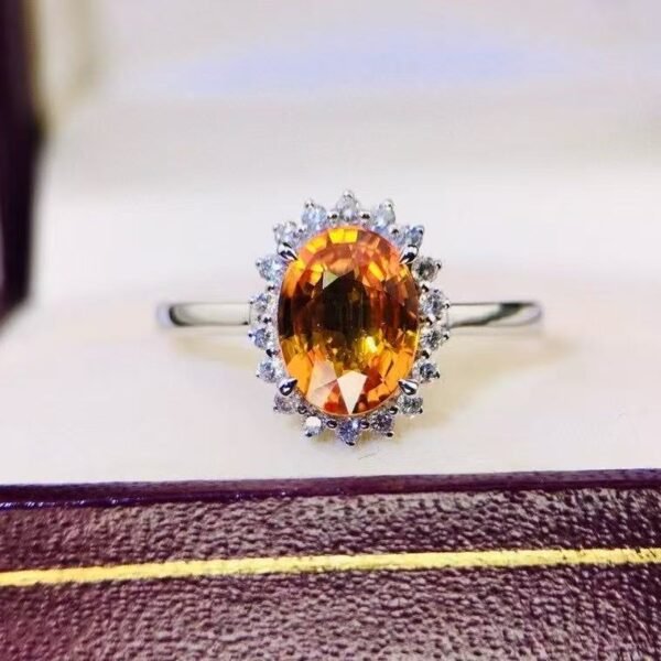 微信图片_20250430102420 SGRAIT Luxury 18k While Gold Jewellery 1.6ct Oval Cut Orange Sapphire With 0.18ct Diamonds Jewelry Ring for Women No reviews yet