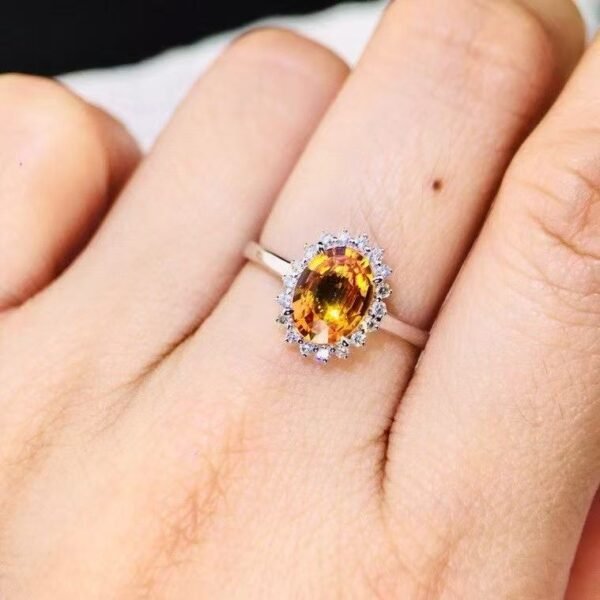 微信图片_20250430102435 SGRAIT Luxury 18k While Gold Jewellery 1.6ct Oval Cut Orange Sapphire With 0.18ct Diamonds Jewelry Ring for Women No reviews yet